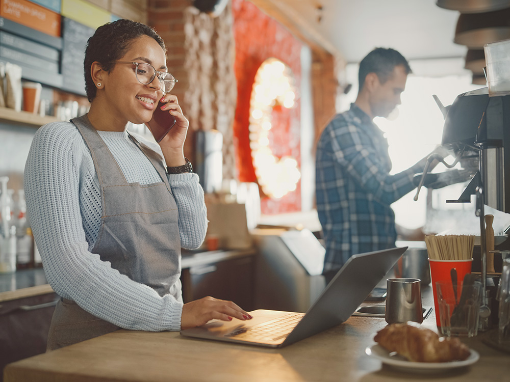 Woman working with employees