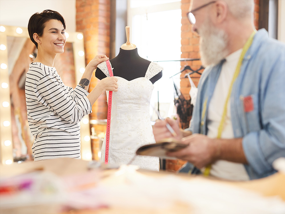 Business owner working with employee